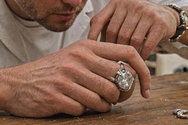 Jeweler working on custom ring design